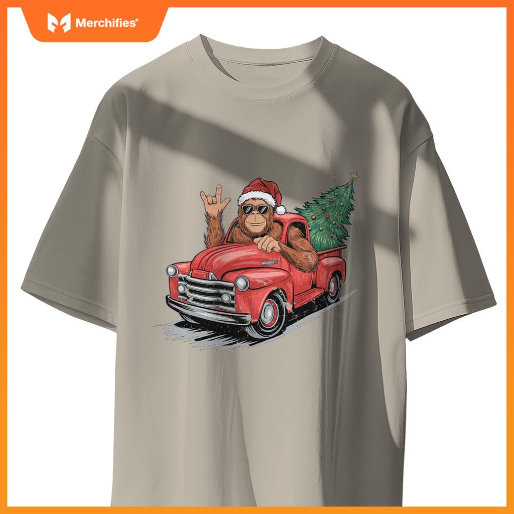Bigfoot Rock On Christmas Tree Light Driving Truck Boys Men T-Shirt