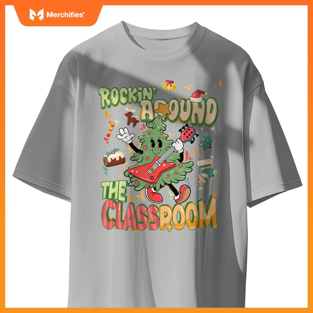 Rocking around classroom teacher christmas tree with guitar